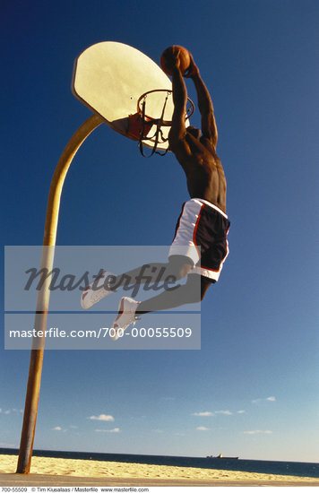 People Dunking Basketballs